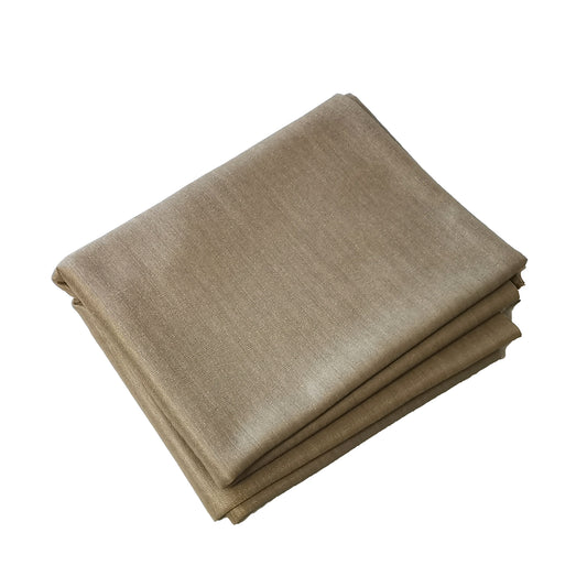 Folded stack of soft silver and cotton conductive fabric
