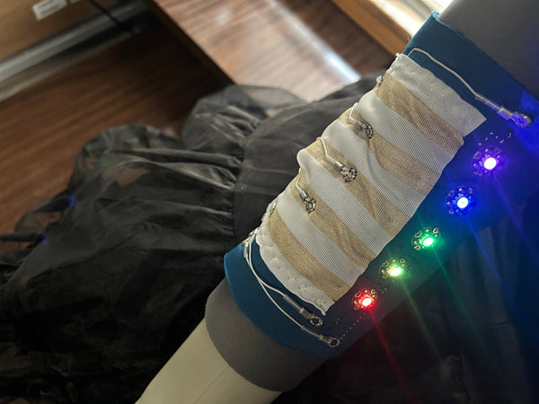 Wearable Simon Game kit with conductive fabric switches and WS2812B LEDs
