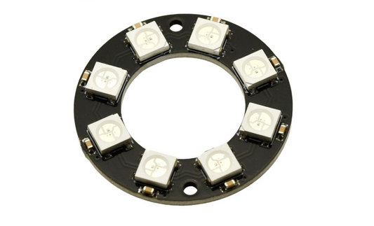 A circular black electronic circuit board featuring eight square white surface-mount LED chips arranged in a ring, isolated on a white background.