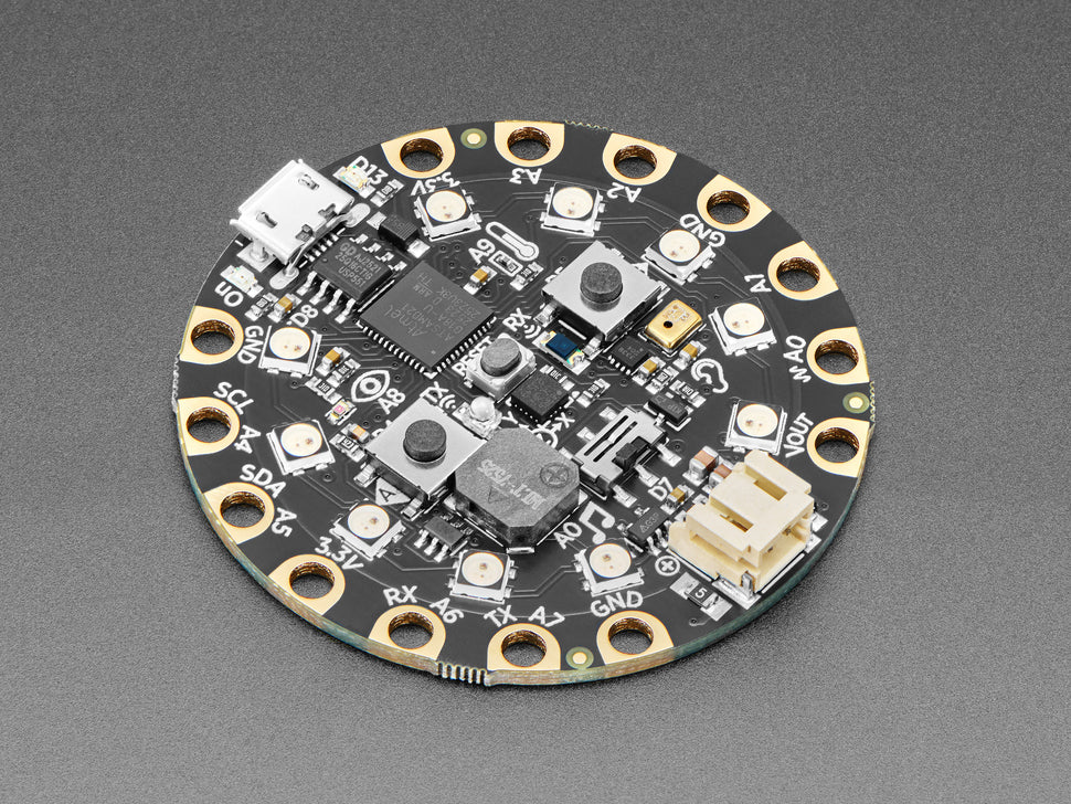 Circular electronic circuit board on a gray background