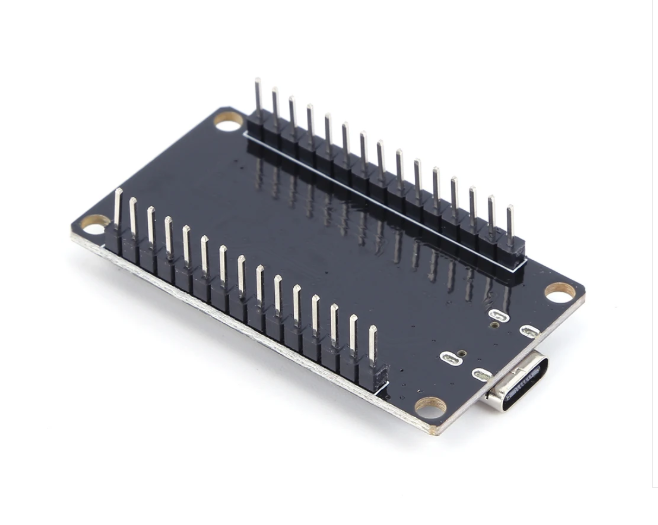 A black electronic breadboard module with multiple rows of silver pins and a USB-C port, shown on a clean white background.